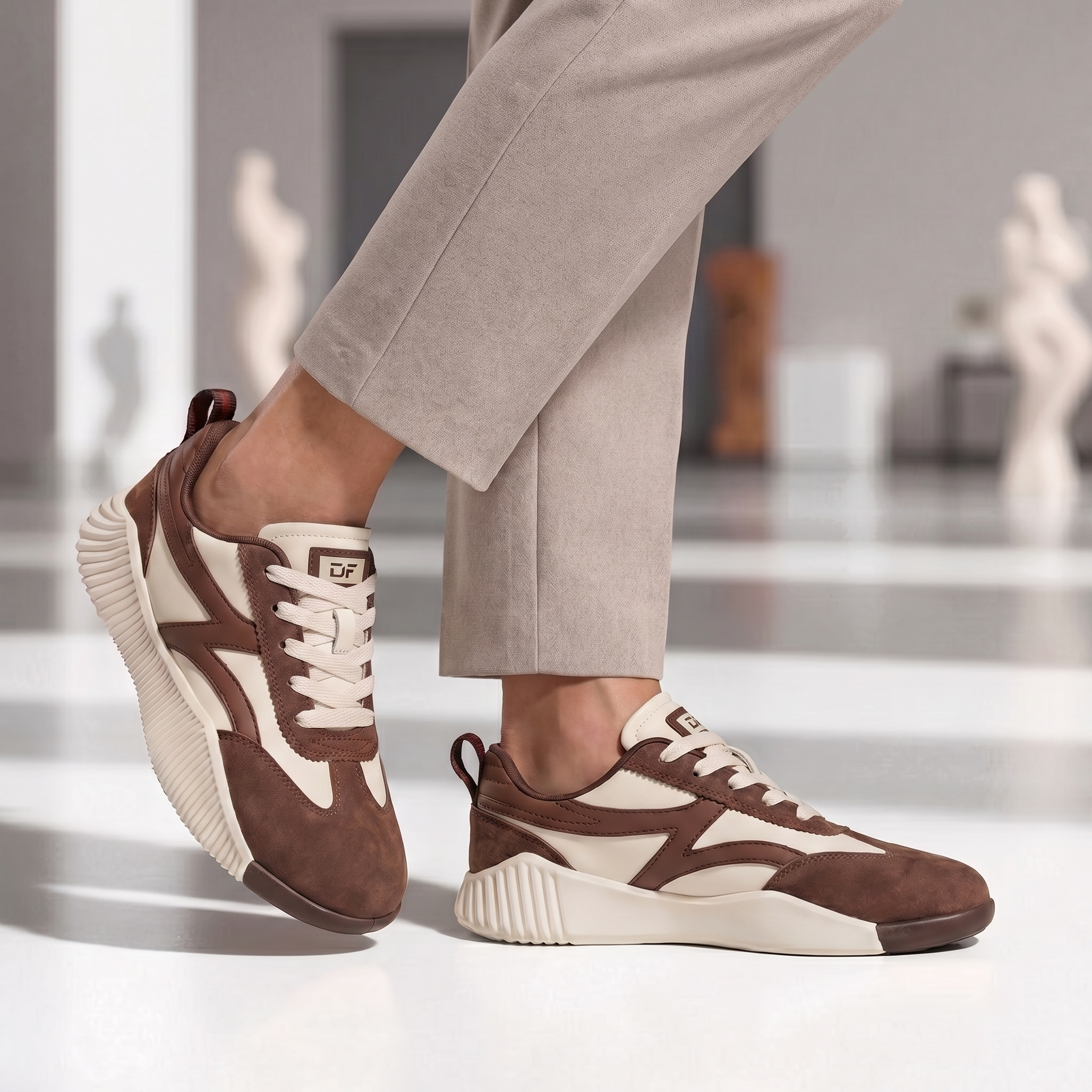 Woman walking in DeFlorance Cloudea 2.0 sneakers in Mocha
